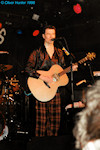 Stuart singing and looking at audience